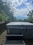 Relax in the hot tub with the newly opened view. 